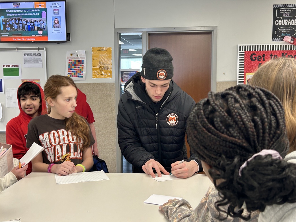 Max Cullen Signing autographs for students