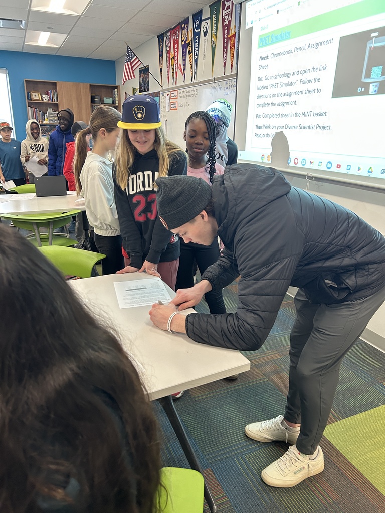 Max Cullen Signing autographs for students
