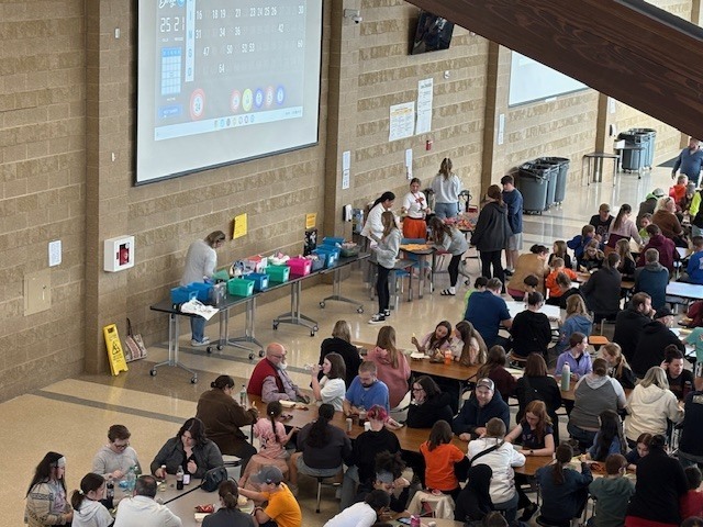 families in the cafeteria for bingo night
