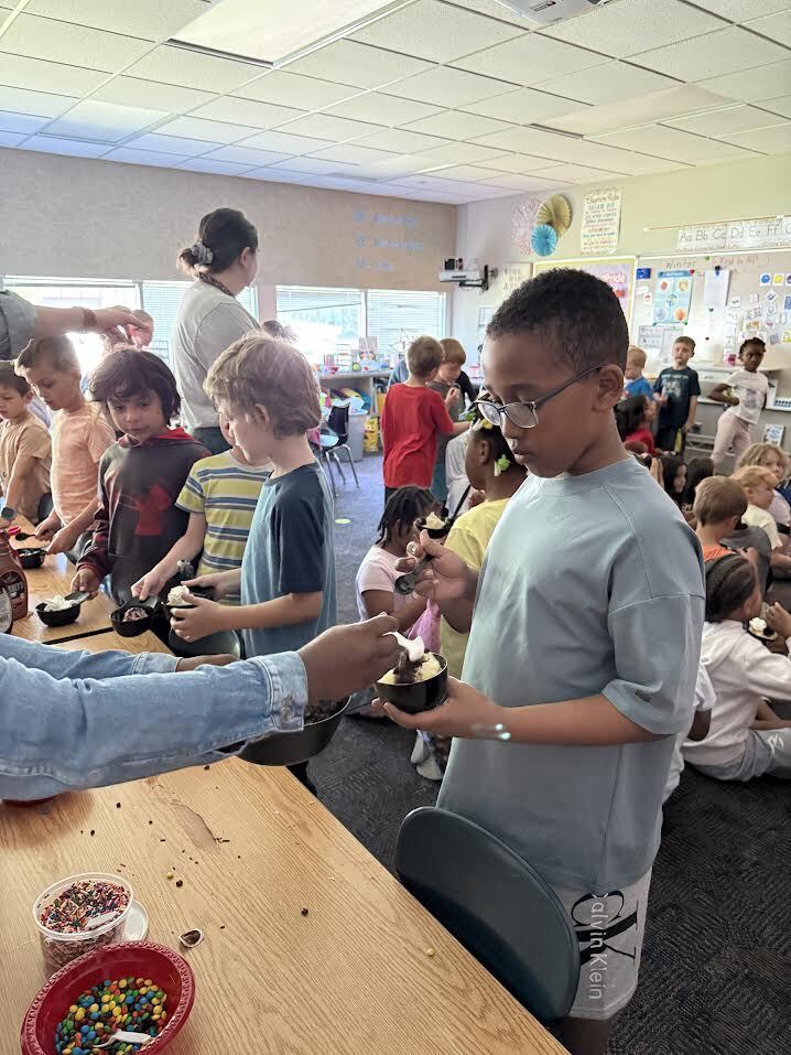 Our 1st graders celebrated the end of the school year in the sweetest way possible—with an ice cream sundae bar! Serving up scoops in these adorable 'M' baseball caps was a home run with the kids. We are so proud of our little MVPs and how much they’ve grown this year!