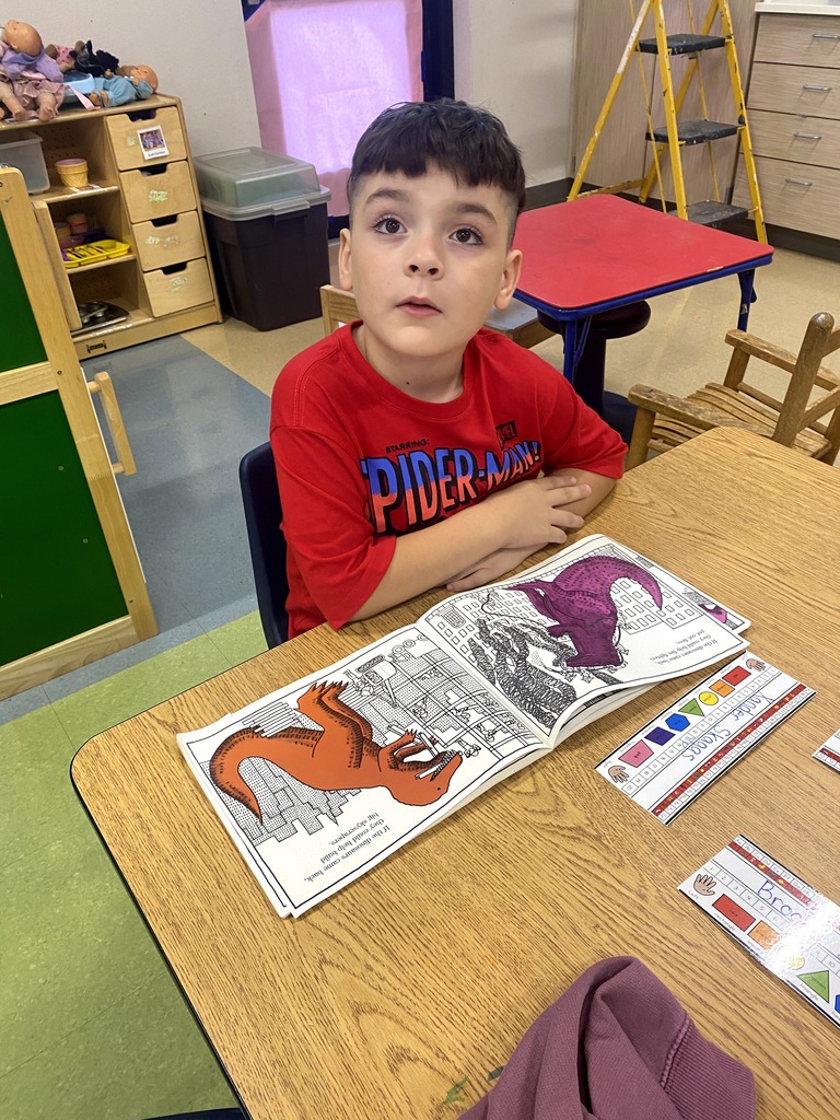 A student exploring a book