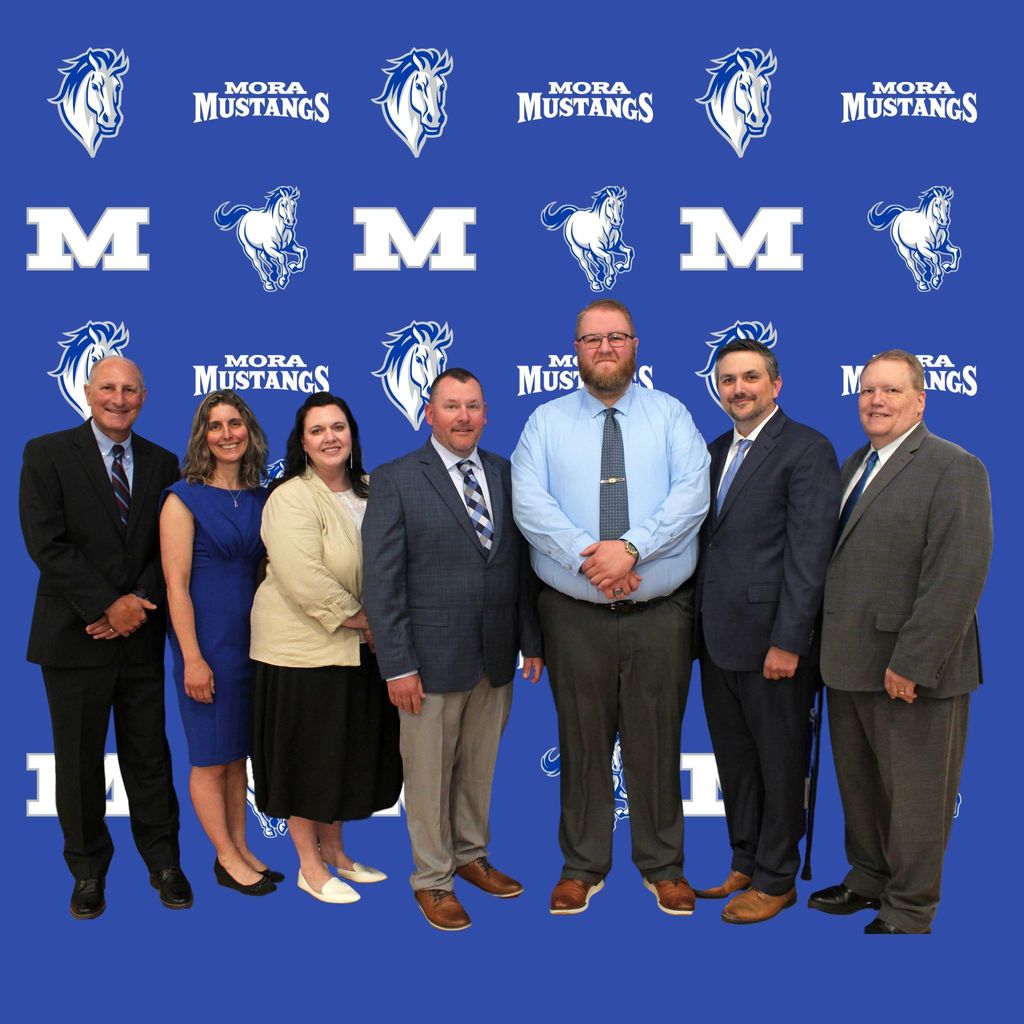 Mora Public School Board: (left to right): Superintendent Dan Voce, Member Amy Schultz, Member Jill Koch, Member Ken Mattson, Member Dakota Helmbrecht, Member Matthew Heggernes, Member Moe.