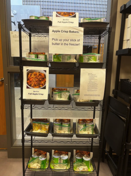 A rack full of apple crisps kits for MHS students to pick up in the food shelf.