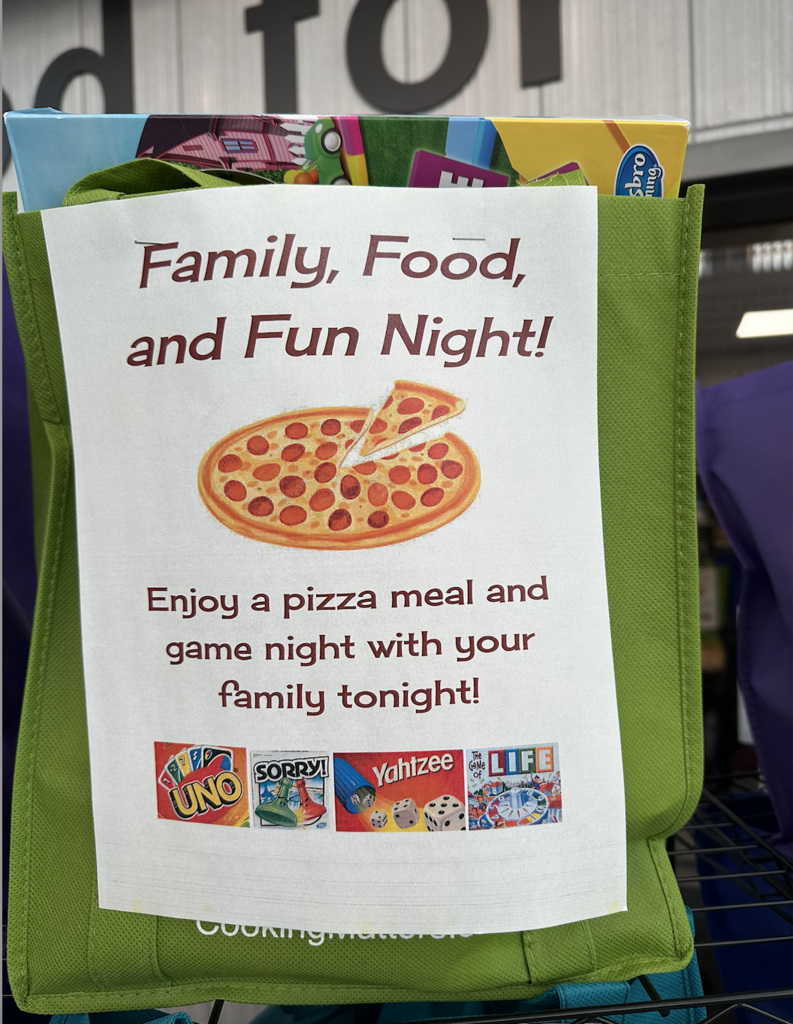 Family food and fun night bag. Enjoy a pizza meal and game night with your family tonight.