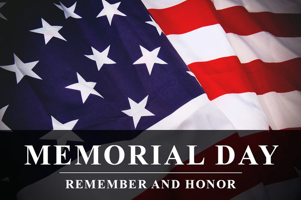 An american flag with Memorial Day Remember And Honor in front of it