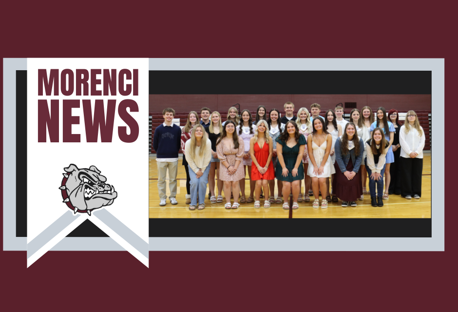 a group of students posing after the NHS induction