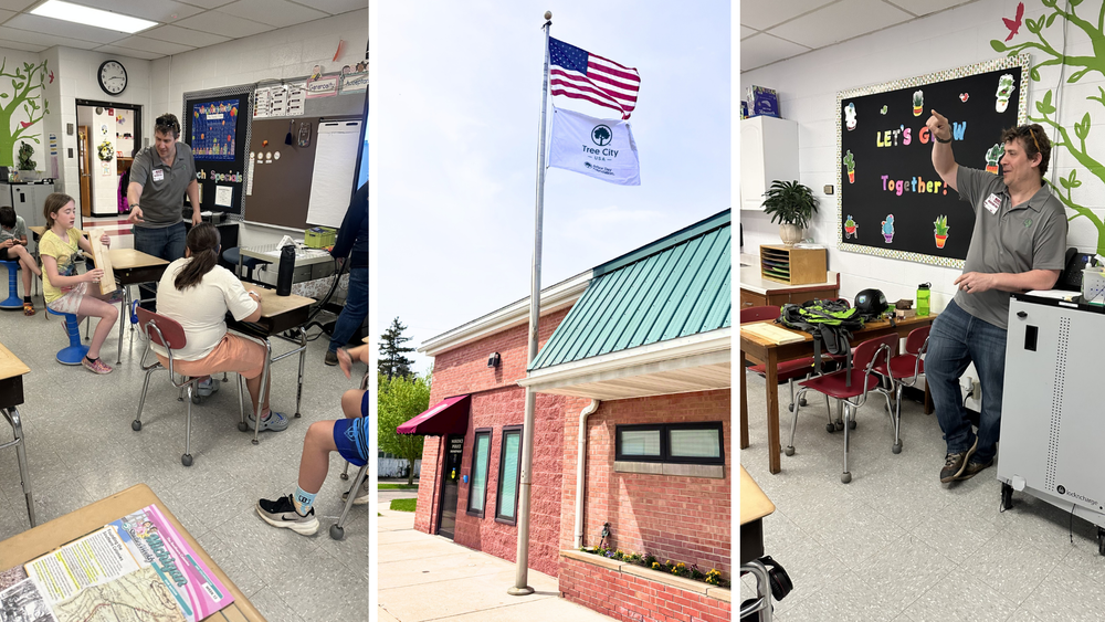 Classroom teaching with arborist and Tree City flag at City Hall