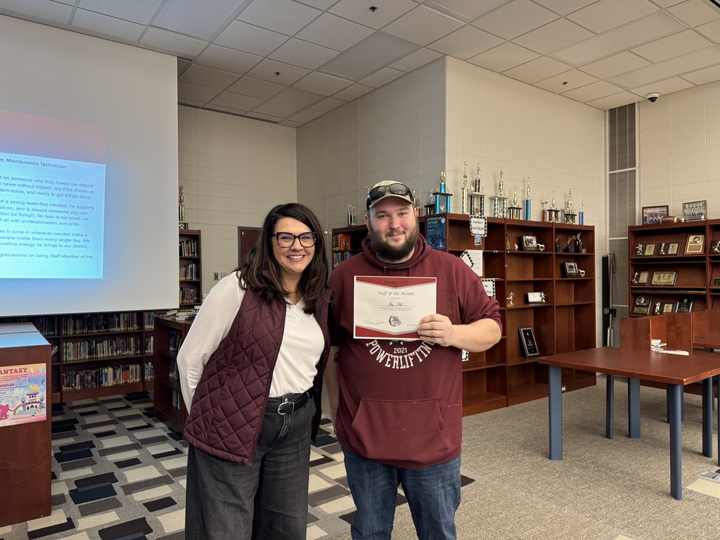 picture of superintendent ellis and january staff of the month jay pike.