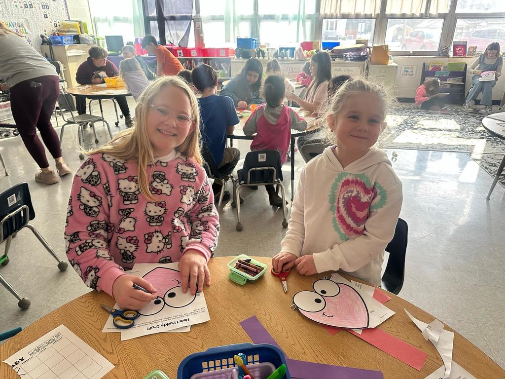 two girls working on class project