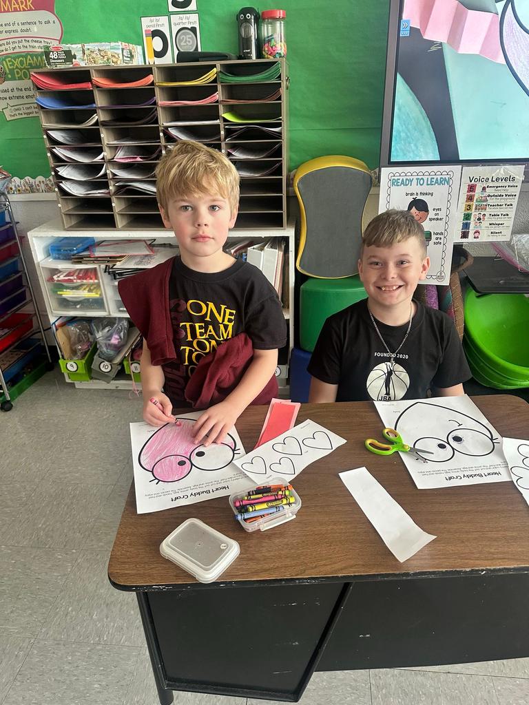 two boys working on class project