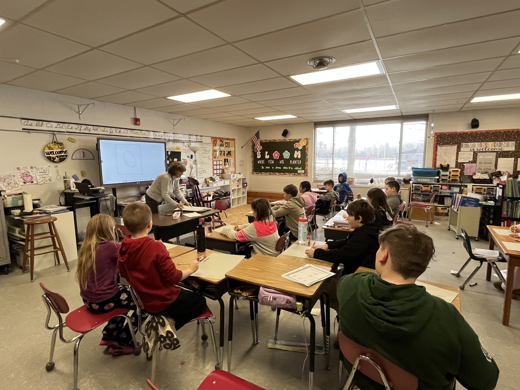 teacher leading a group instruction