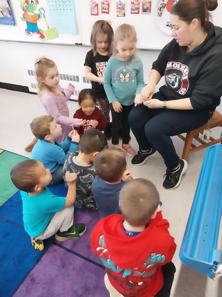 a group of students smelling spices