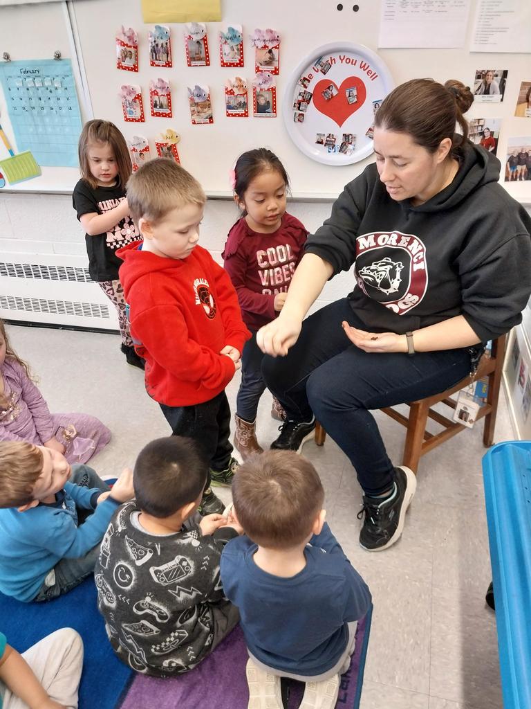 a group of students smelling spices