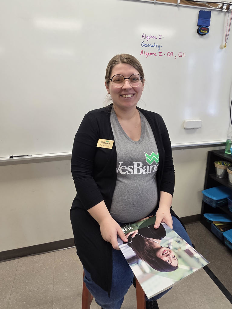 bank staff member presenting to students
