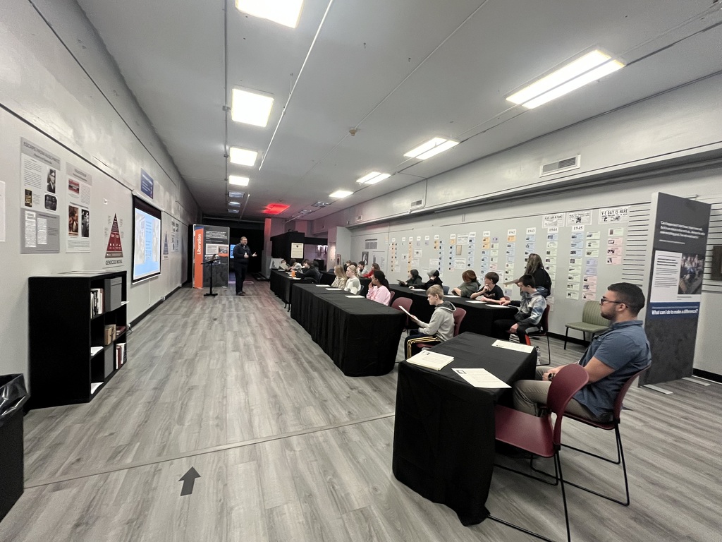 Pictures of students at the Holocaust Museum in Adrian