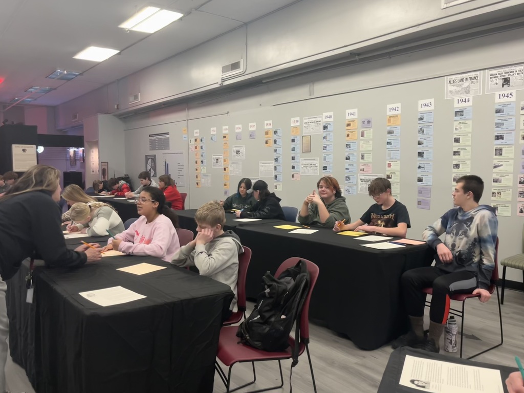 Pictures of students at the Holocaust Museum in Adrian