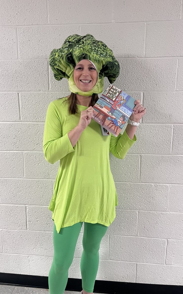 teacher reading dressed up as broccoli