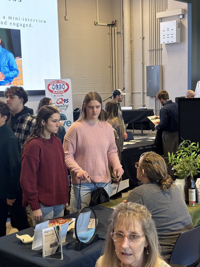 students at a booth at the align career fair