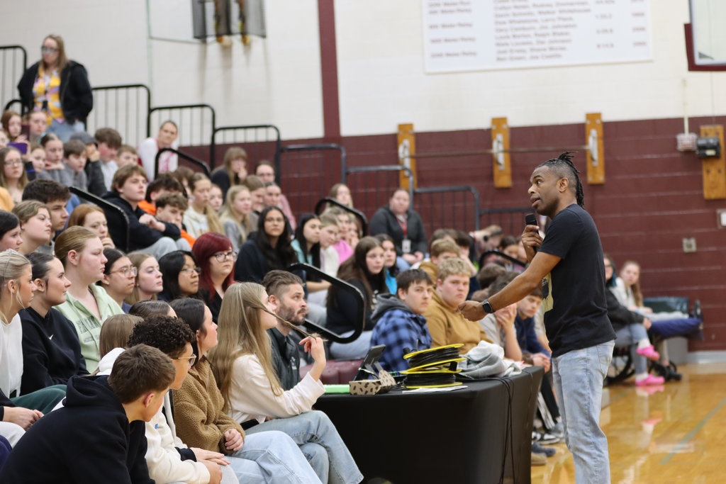 students listening to speaker