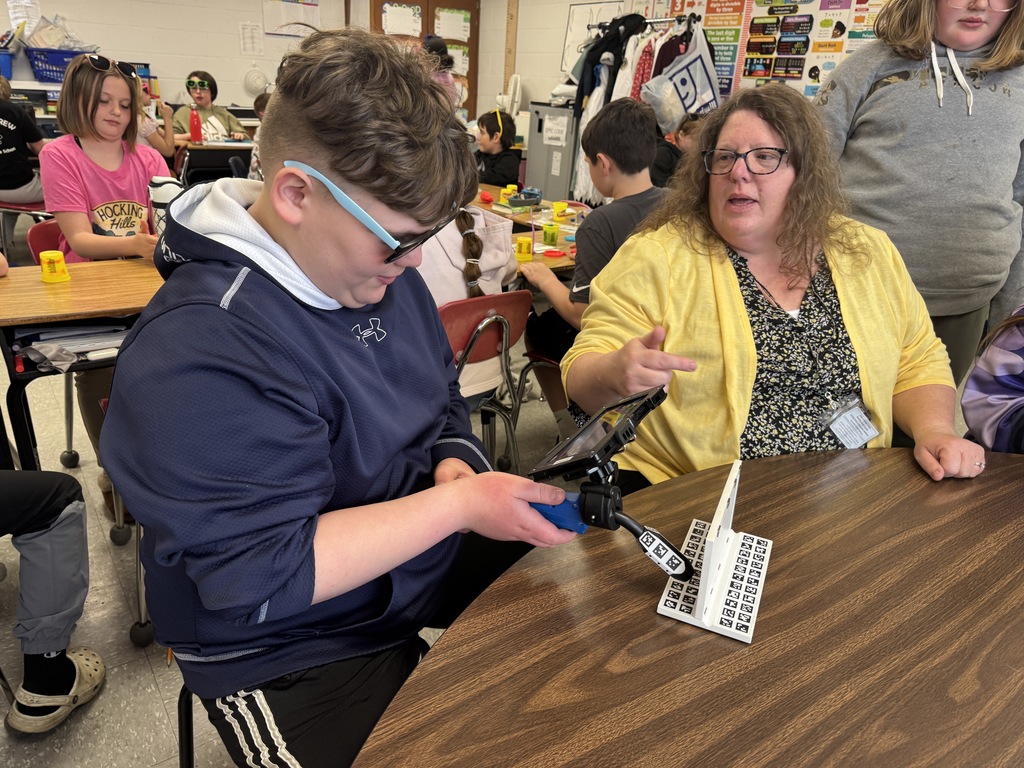 students working with playdough to see how a welder welds.