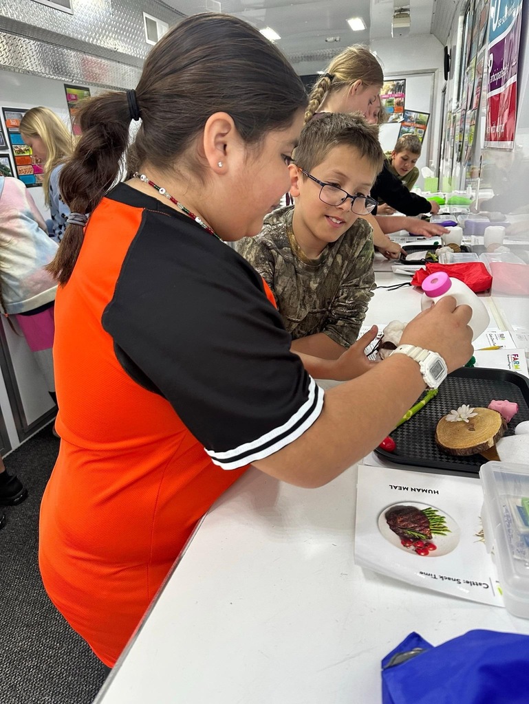 students doing activities in the Farm Science Lab.