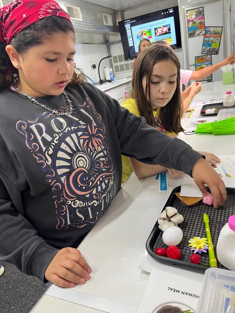students doing activities in the Farm Science Lab.