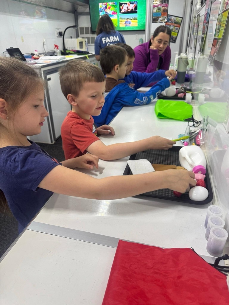 students doing activities in the Farm Science Lab.