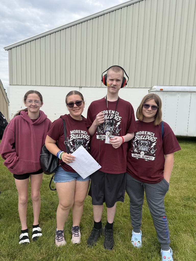 group of 4 students posing for picture.