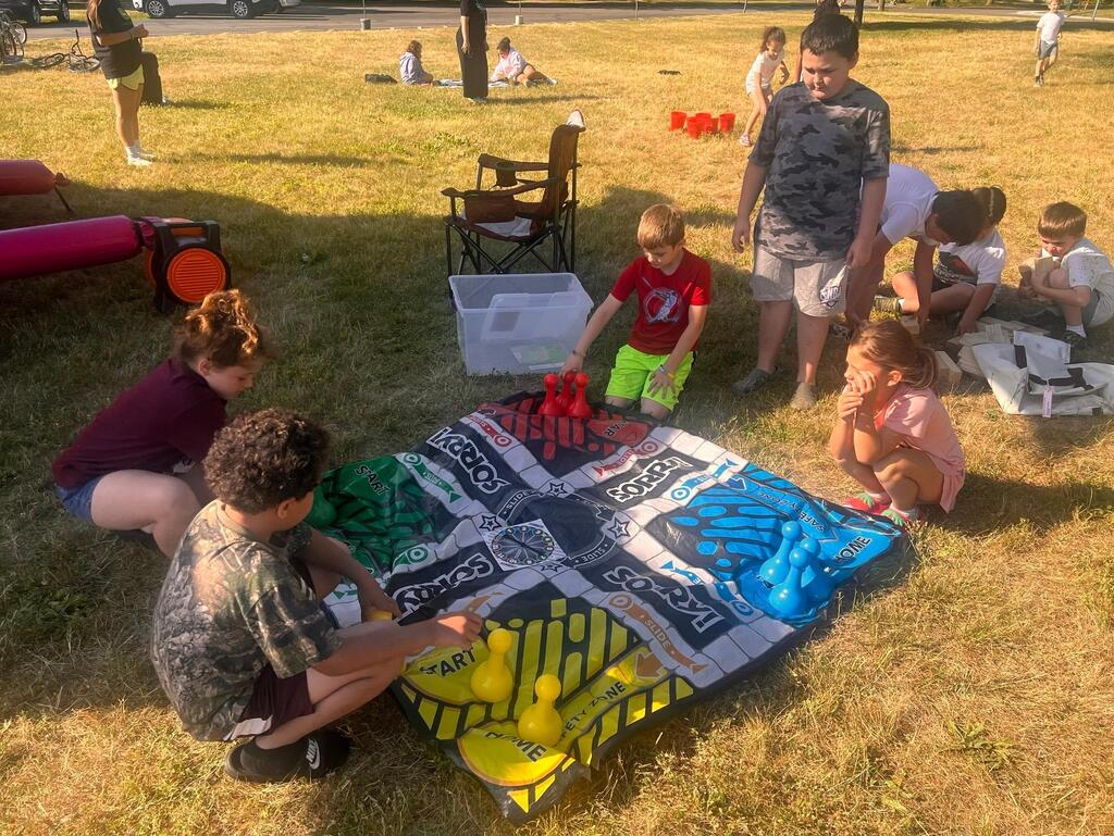 students playing yard game