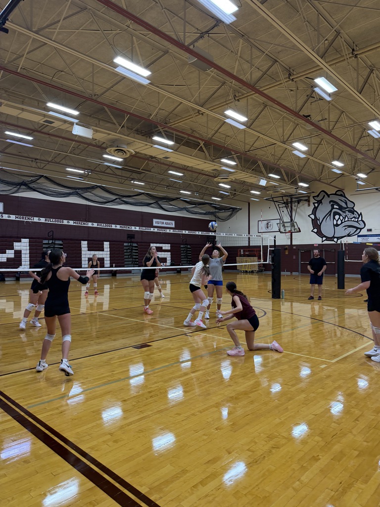 volleyballl player setting the ball