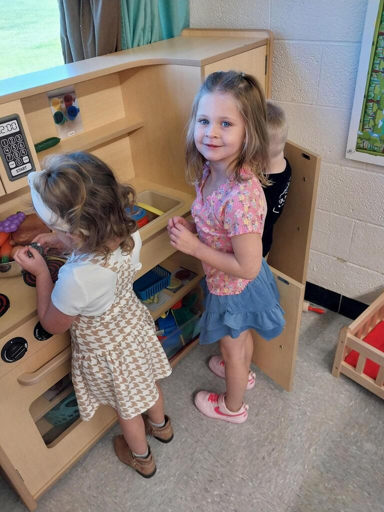 young students playing