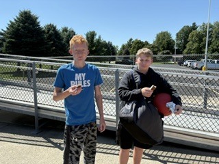 students eating ice cream sandwiches