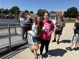 students eating ice cream sandwiches