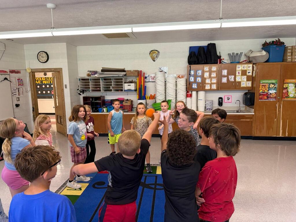 group of students doing teambuilding activity