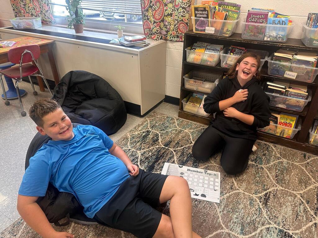 two students playing a math game