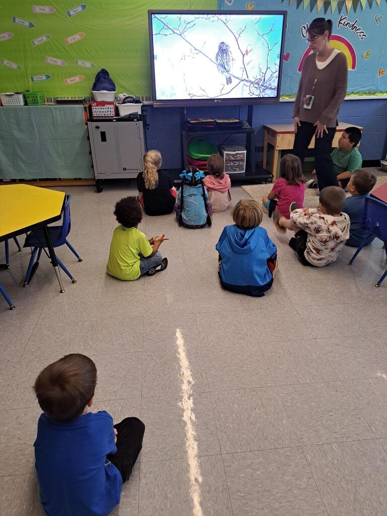 students watching a video in class