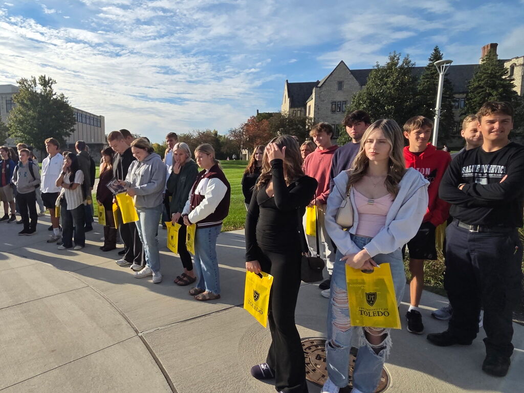 a large group of students standing outside