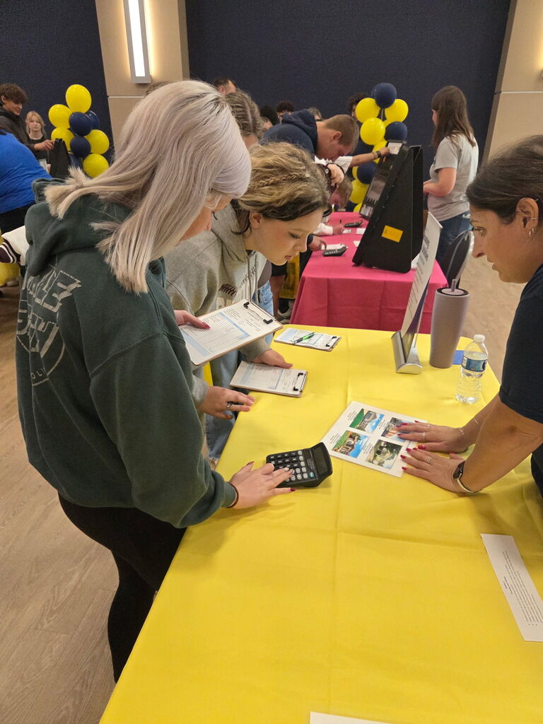 two students using a calculator