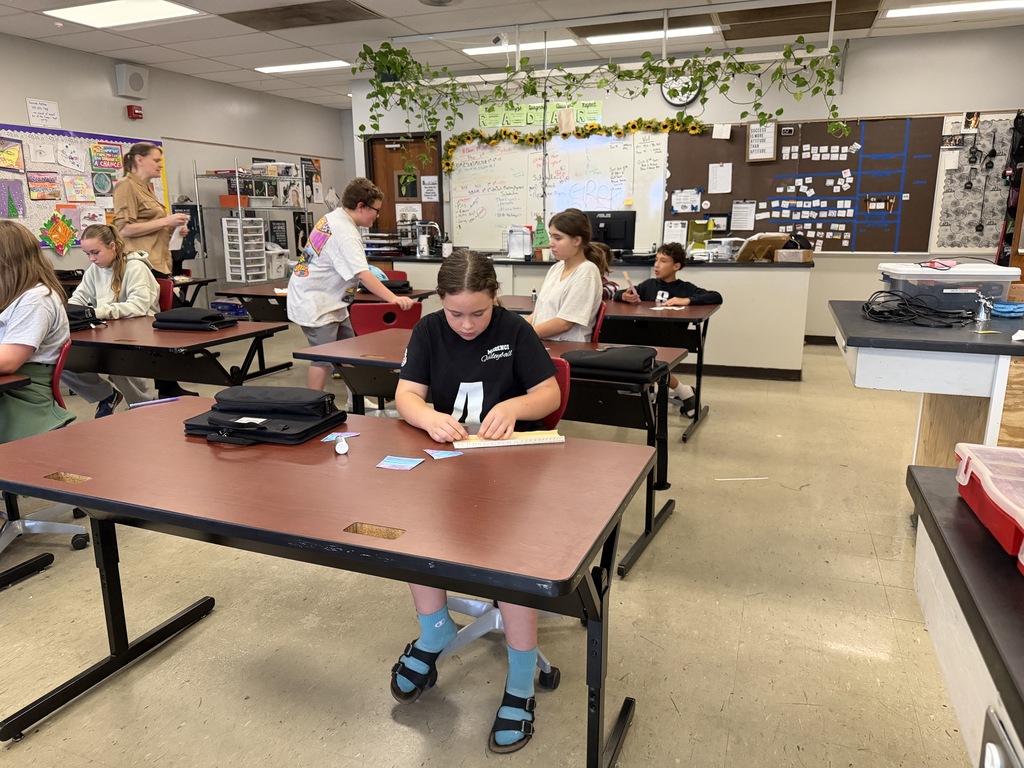 students working on a project in class
