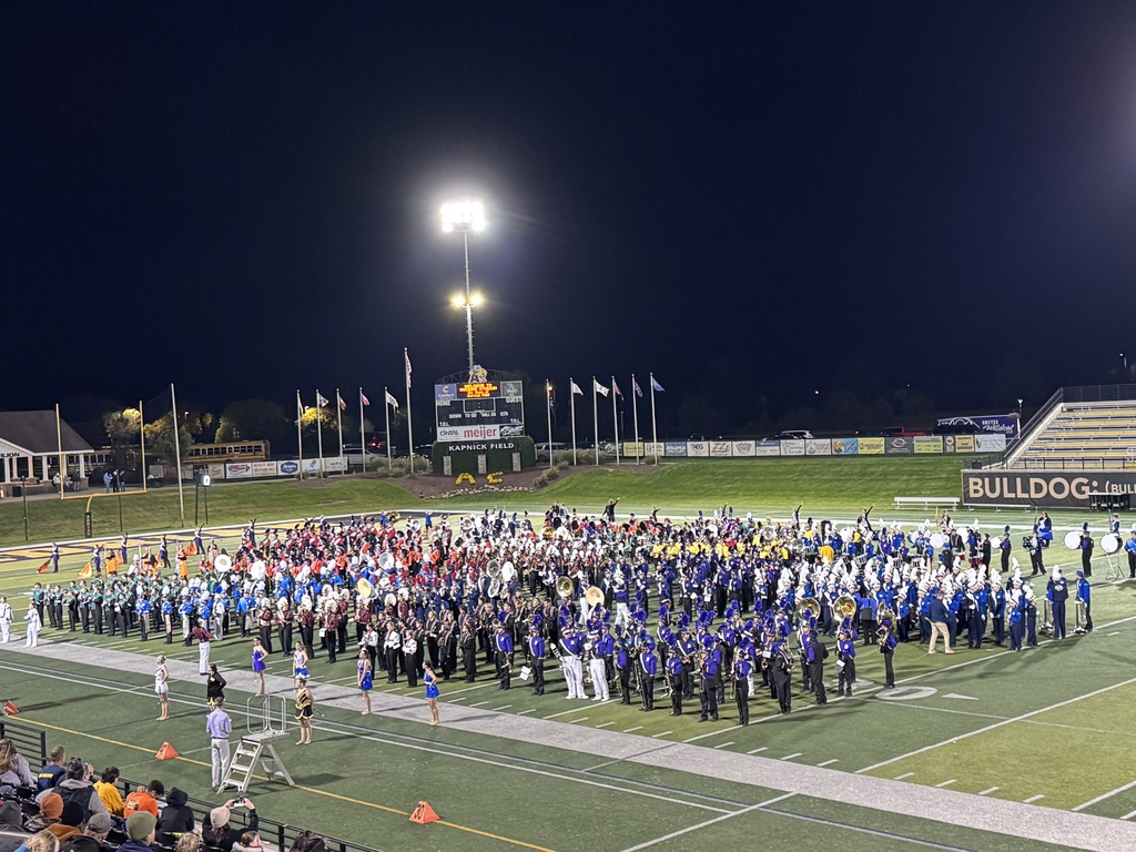 lenawee county marching band students performing