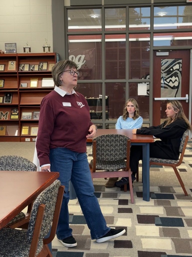 adult presenting to students