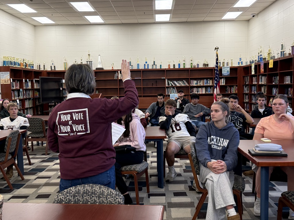 adult presenting to students