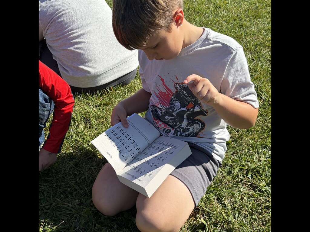 student reading a dictionary