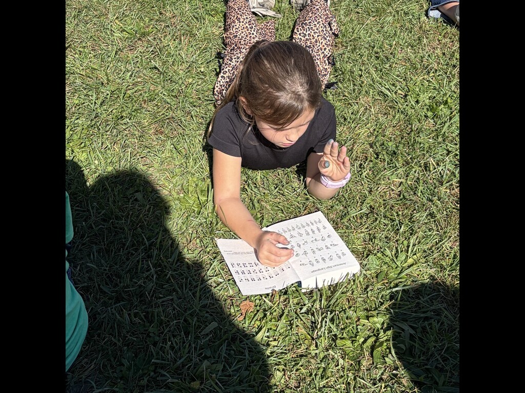 student reading a dictionary
