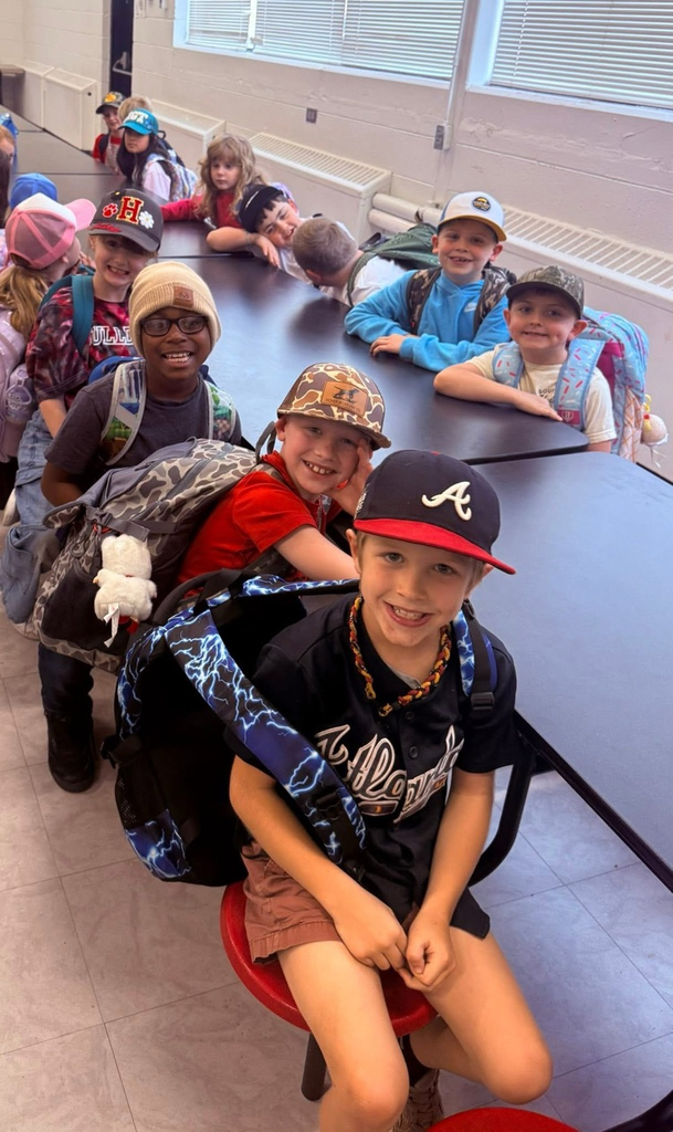 students wearing hats to celebrate reading nonfiction books