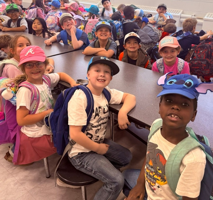 students wearing hats to celebrate reading nonfiction books