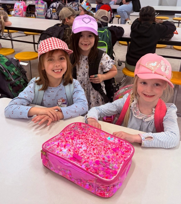 students wearing hats to celebrate reading nonfiction books