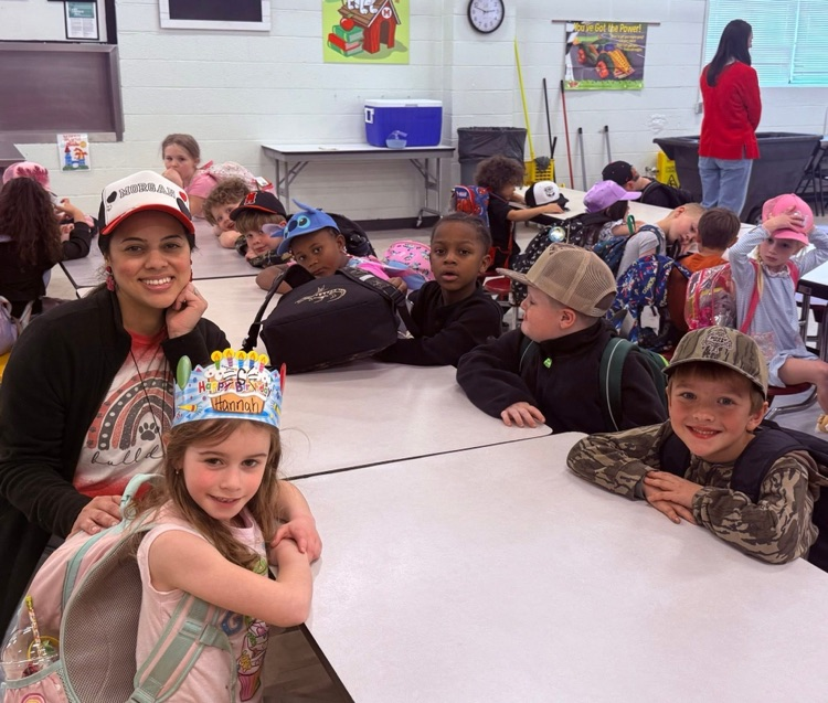 students wearing hats to celebrate reading nonfiction books