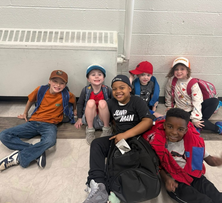 students wearing hats to celebrate reading nonfiction books