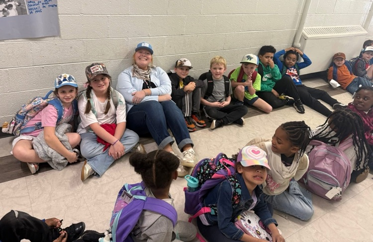 students wearing hats to celebrate reading nonfiction books